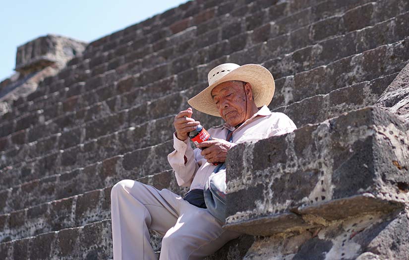 Man Looking At Coke